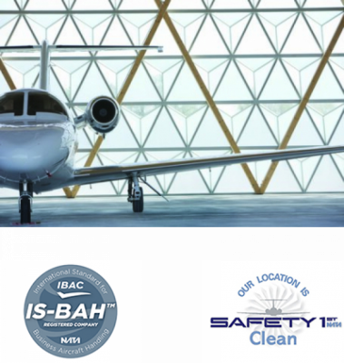 Jet dans un hangar Sky valet et logos is-bah safety 1st