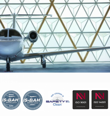 Jet dans un hangar Sky valet et logos is-bah safety 1st